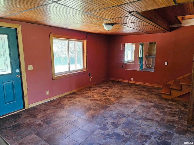 foyer entrance with wood ceiling