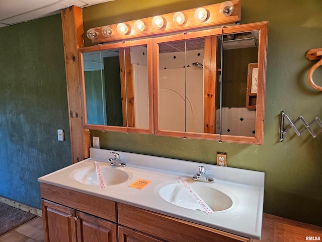 bathroom with vanity and tile patterned floors