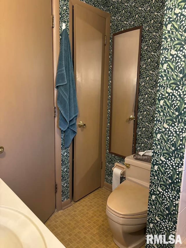 bathroom featuring toilet