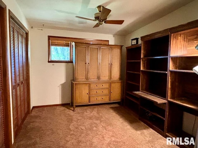 unfurnished bedroom featuring a closet, carpet flooring, and baseboards