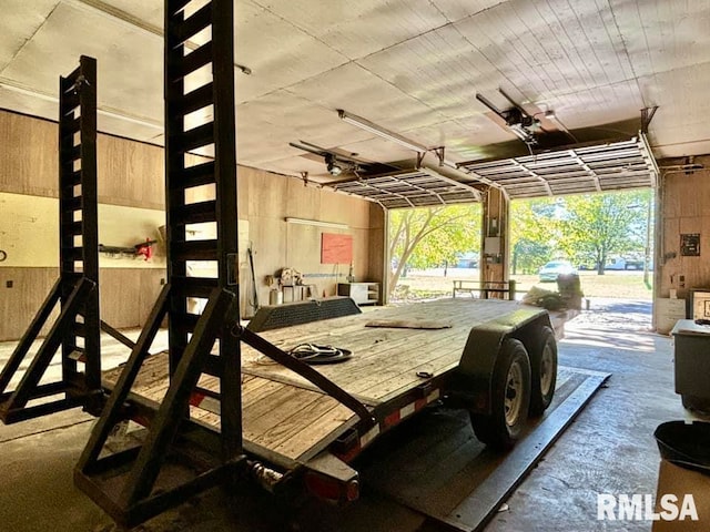 garage with wood walls