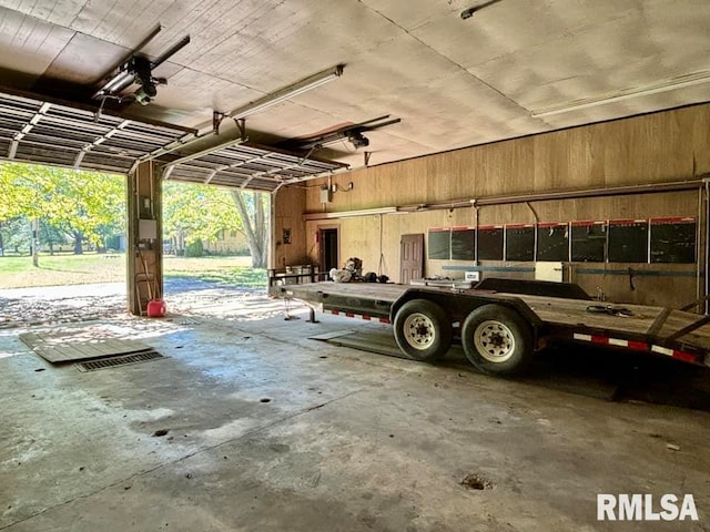 garage with wood walls