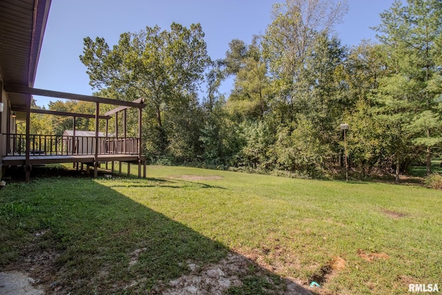 view of yard with a deck