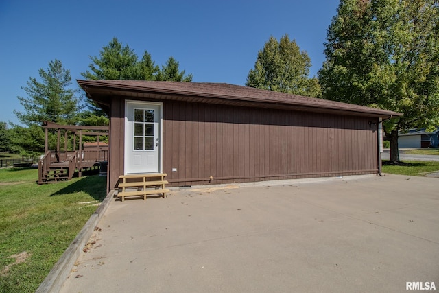 garage with a yard