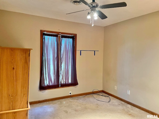 unfurnished room featuring ceiling fan