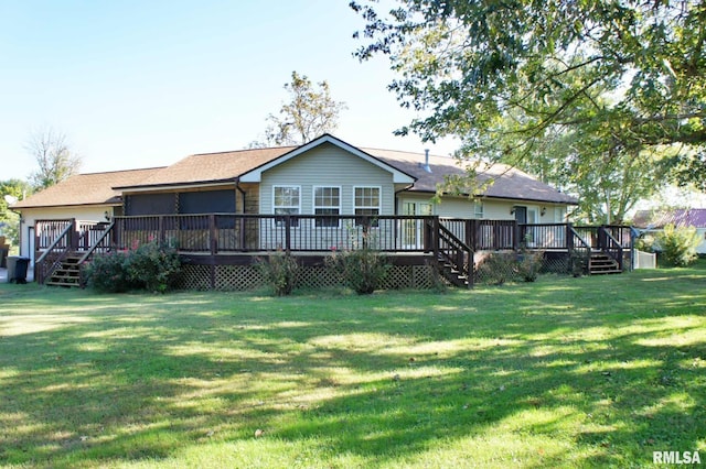 back of property featuring a yard and a deck