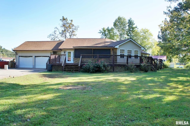 single story home featuring a deck, a garage, and a front yard