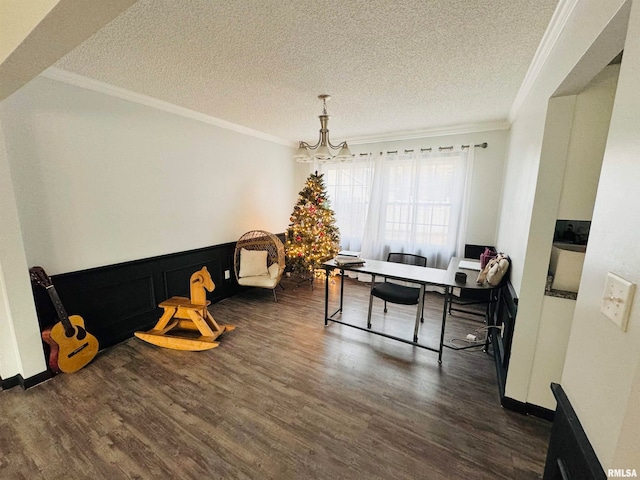 office featuring an inviting chandelier, a textured ceiling, dark hardwood / wood-style floors, and crown molding