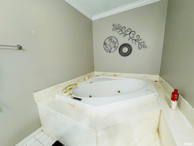 bathroom featuring a bathtub, crown molding, and a textured ceiling