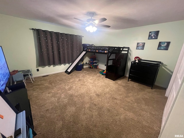 bedroom with ceiling fan and light colored carpet