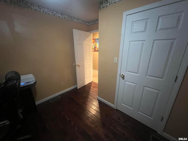 office space featuring dark wood-type flooring