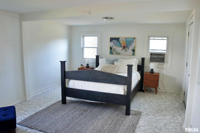 bedroom featuring carpet floors and multiple windows