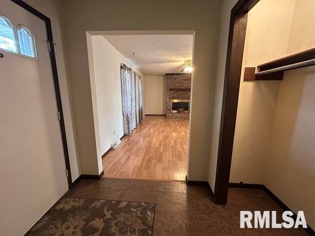 hall featuring hardwood / wood-style flooring