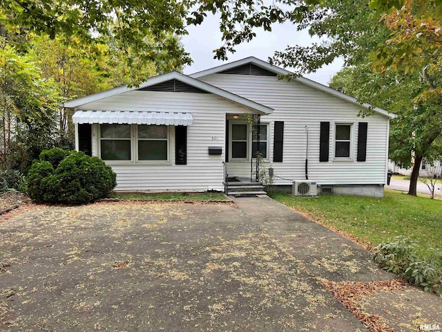 view of front of home with ac unit