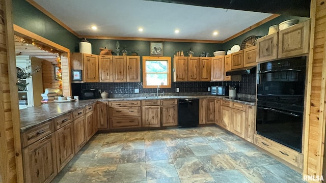 kitchen featuring black appliances, crown molding, decorative backsplash, and sink