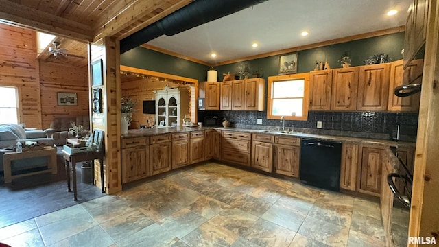 kitchen featuring wood walls, sink, beam ceiling, tasteful backsplash, and black appliances