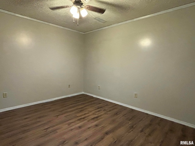 spare room featuring ceiling fan, a textured ceiling, crown molding, and dark wood-type flooring