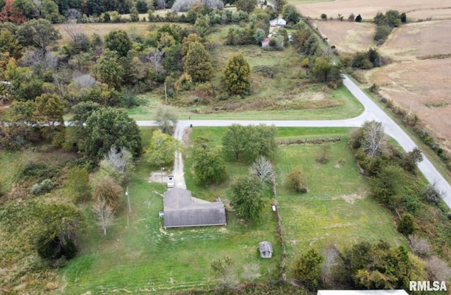 birds eye view of property featuring a rural view