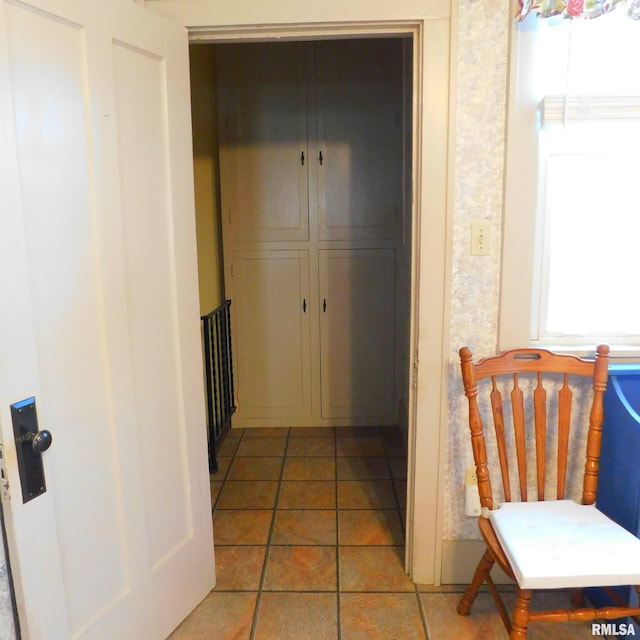 hall featuring tile patterned floors