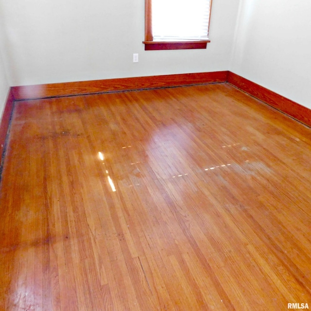 empty room with light wood-type flooring