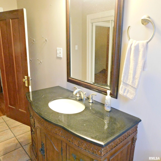 bathroom featuring vanity and tile patterned floors