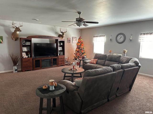 carpeted living room featuring ceiling fan