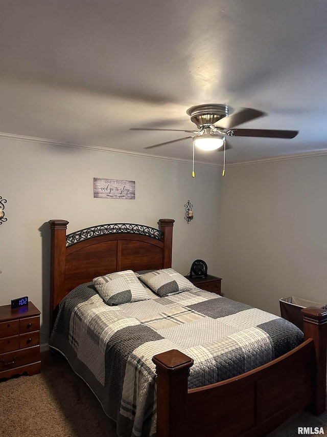 bedroom featuring crown molding, dark carpet, and ceiling fan