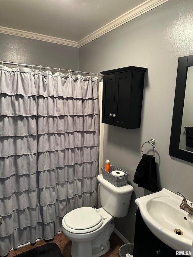 bathroom with vanity, crown molding, a shower with curtain, and toilet