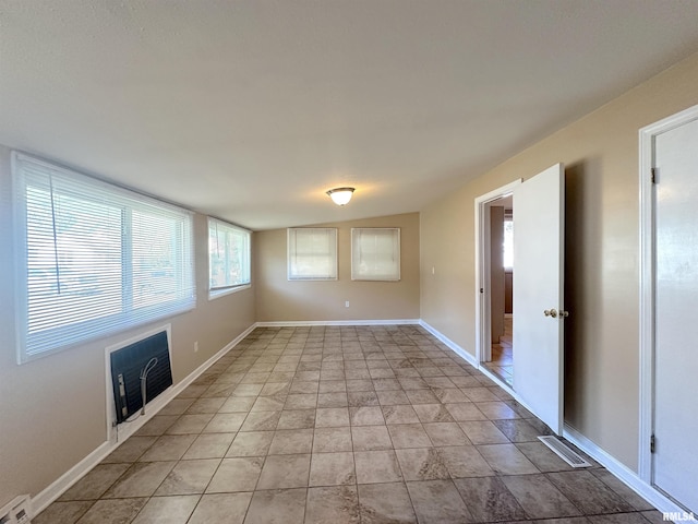 1911 Wall St, Murphysboro, IL 62966 - spare room featuring baseboards and visible vents