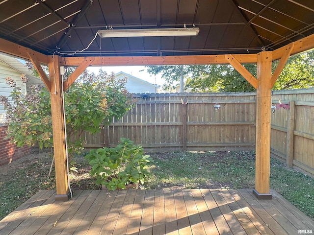 wooden deck featuring a gazebo