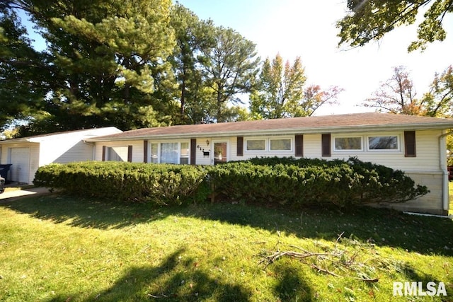ranch-style home with a front lawn