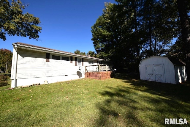 exterior space featuring a deck and a storage unit