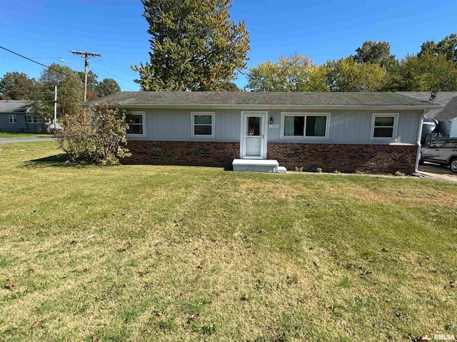 ranch-style house with a front yard