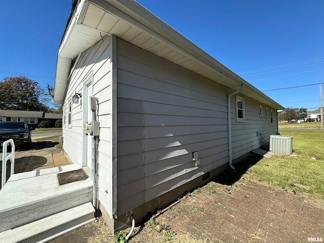 view of home's exterior featuring central air condition unit