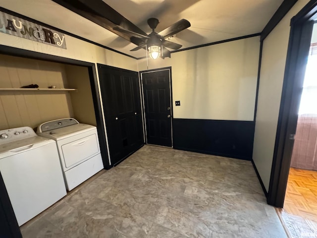 laundry room featuring light parquet floors, washer and clothes dryer, and ceiling fan