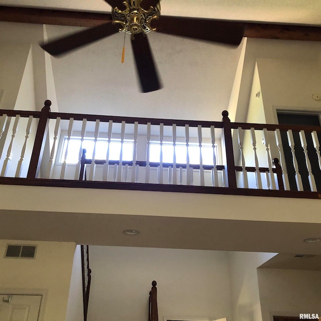 interior details featuring ceiling fan