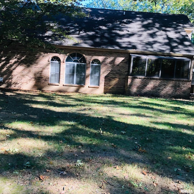 exterior space with a front yard