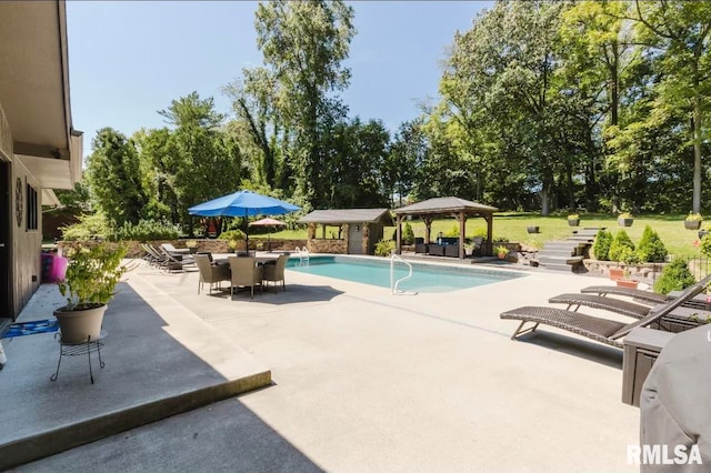 view of pool with a gazebo and a patio area