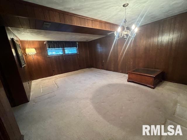 25 SW Crescent Rd, Mount Vernon, IL 62864 - unfurnished dining area featuring wooden walls, a chandelier, and concrete flooring