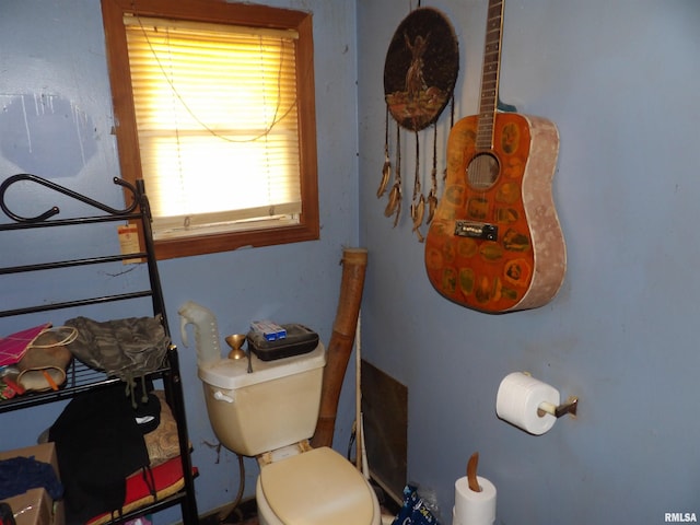 bathroom featuring toilet