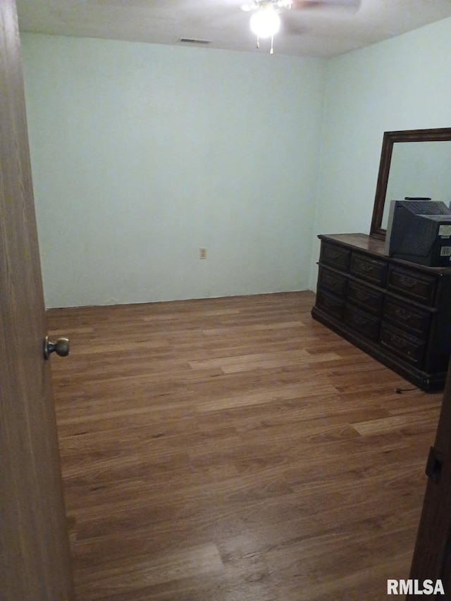 9735 Branch Rd, Oakdale, IL 62268 - bedroom featuring a ceiling fan, visible vents, and wood finished floors