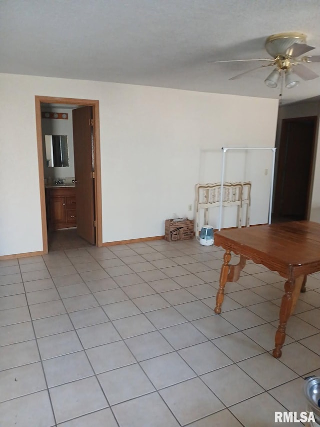 9735 Branch Rd, Oakdale, IL 62268 - interior space featuring light tile patterned floors, ceiling fan, baseboards, and a sink