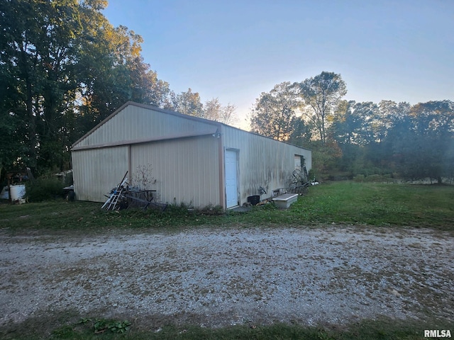 view of outbuilding with a garage