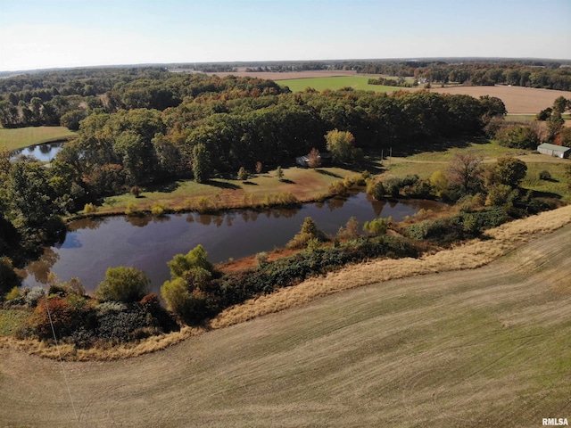 birds eye view of property with a water view and a rural view