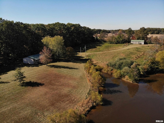 birds eye view of property with a rural view