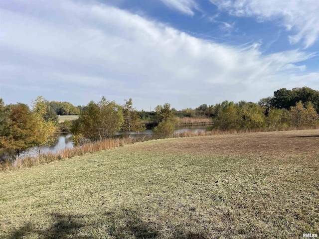 view of yard with a water view