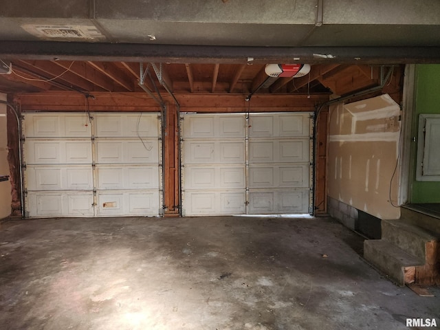 garage featuring a garage door opener