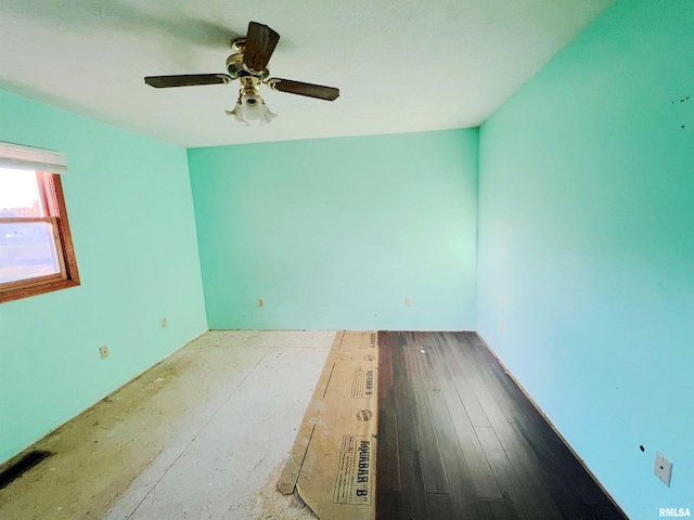 spare room featuring ceiling fan and wood-type flooring