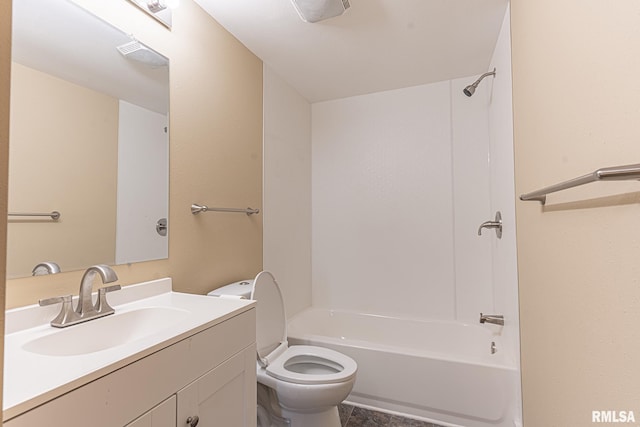 full bathroom with vanity, shower / tub combination, and toilet