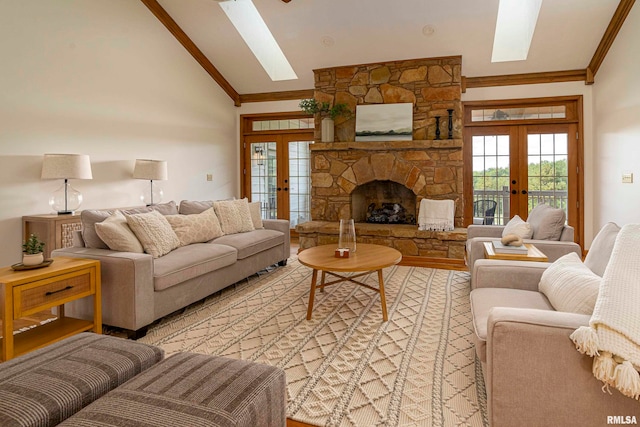 living room featuring french doors, high vaulted ceiling, light hardwood / wood-style flooring, and a fireplace